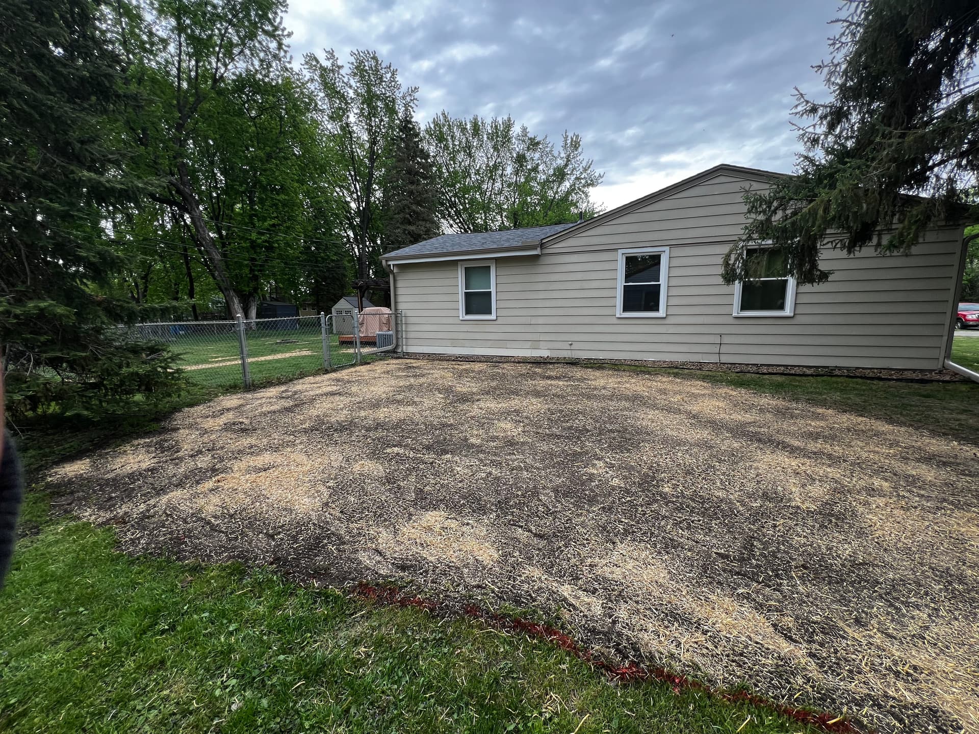 Gallery photos for Regrading and Lawn Renovation to Fix a Soggy, Uneven Yard: Image #1