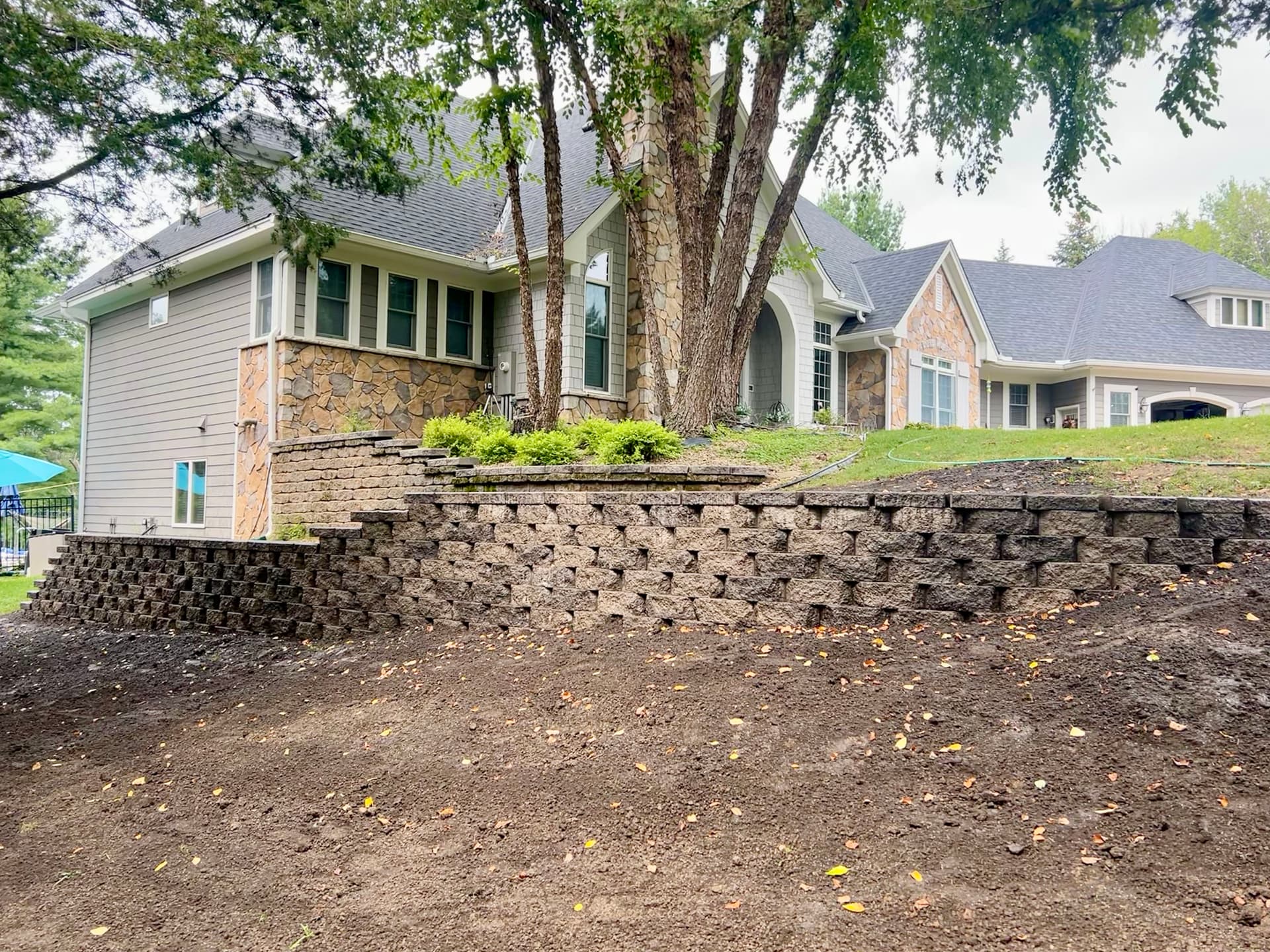 3 Retaining Walls Built to Hold a Seriously Sloped Yard image