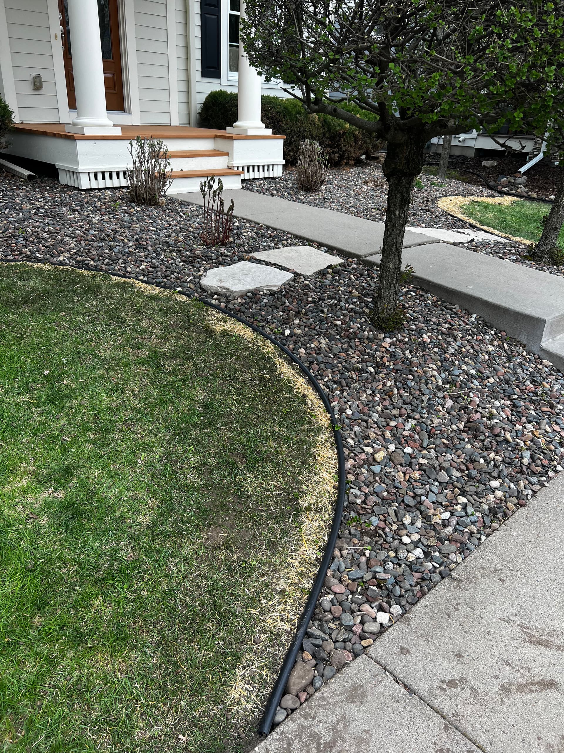 Gallery photos for Bayport Yard Cleanup With Edging, Seeding, and Tree Trimming: Image #2
