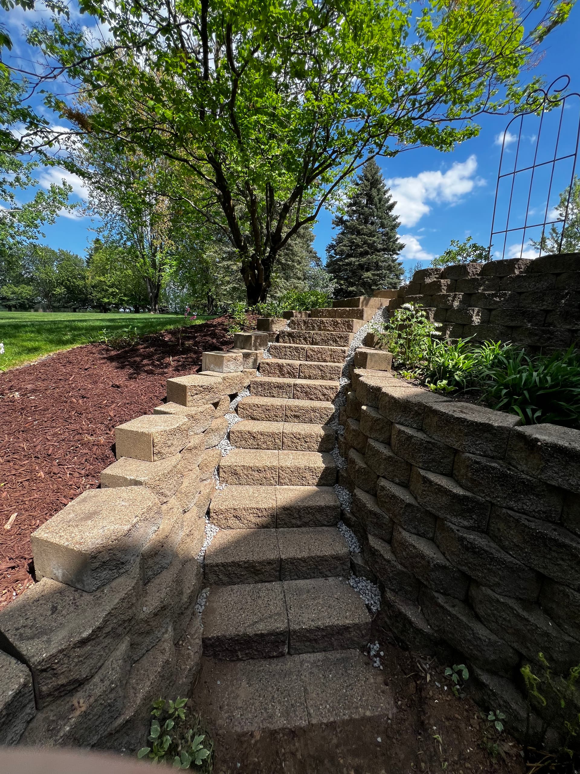 Retaining Wall and Step Releveling Done Right image